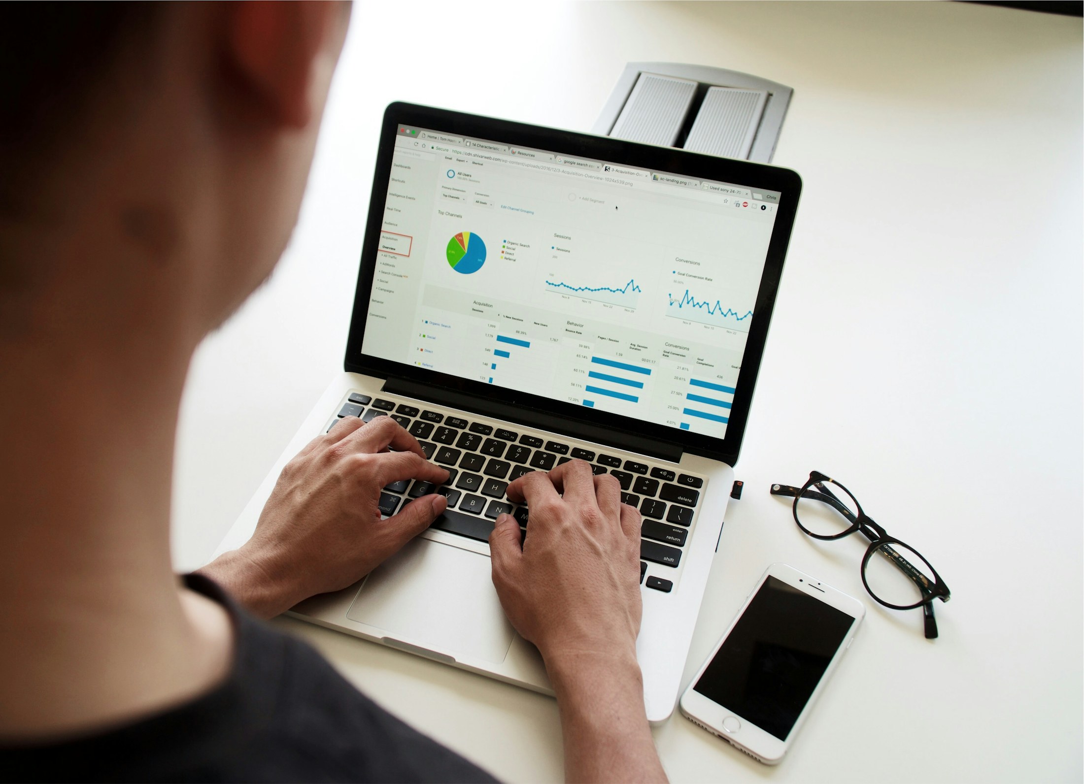 Bright CRM dashboard on a laptop in a workspace